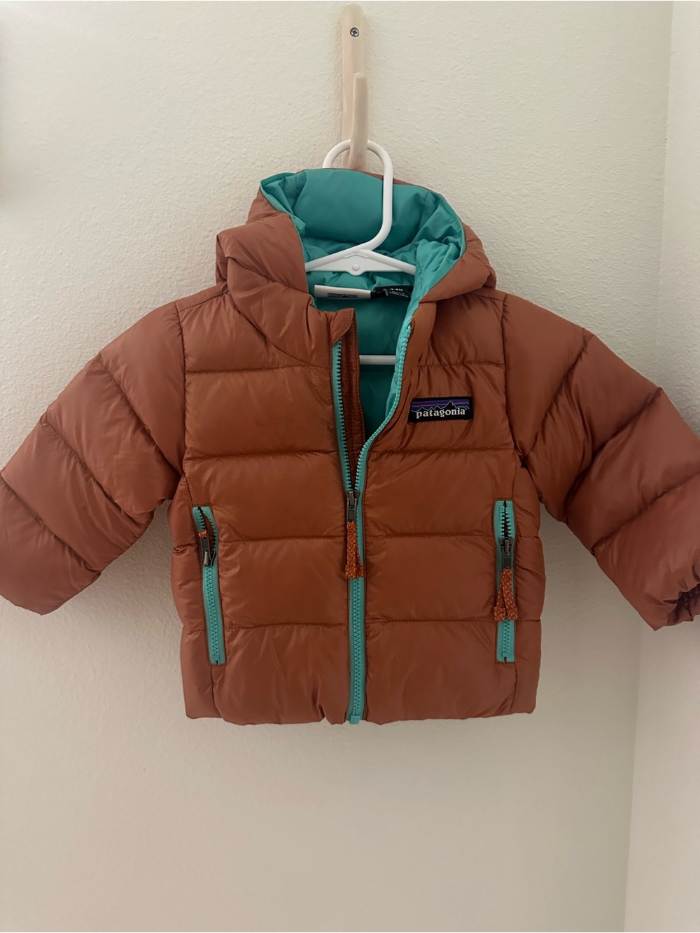 Patagonia Kids Rust Puffer Jacket with Teal Accents